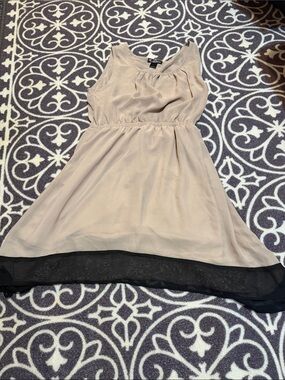 Delicious Beige Mini Dress with Black Hem